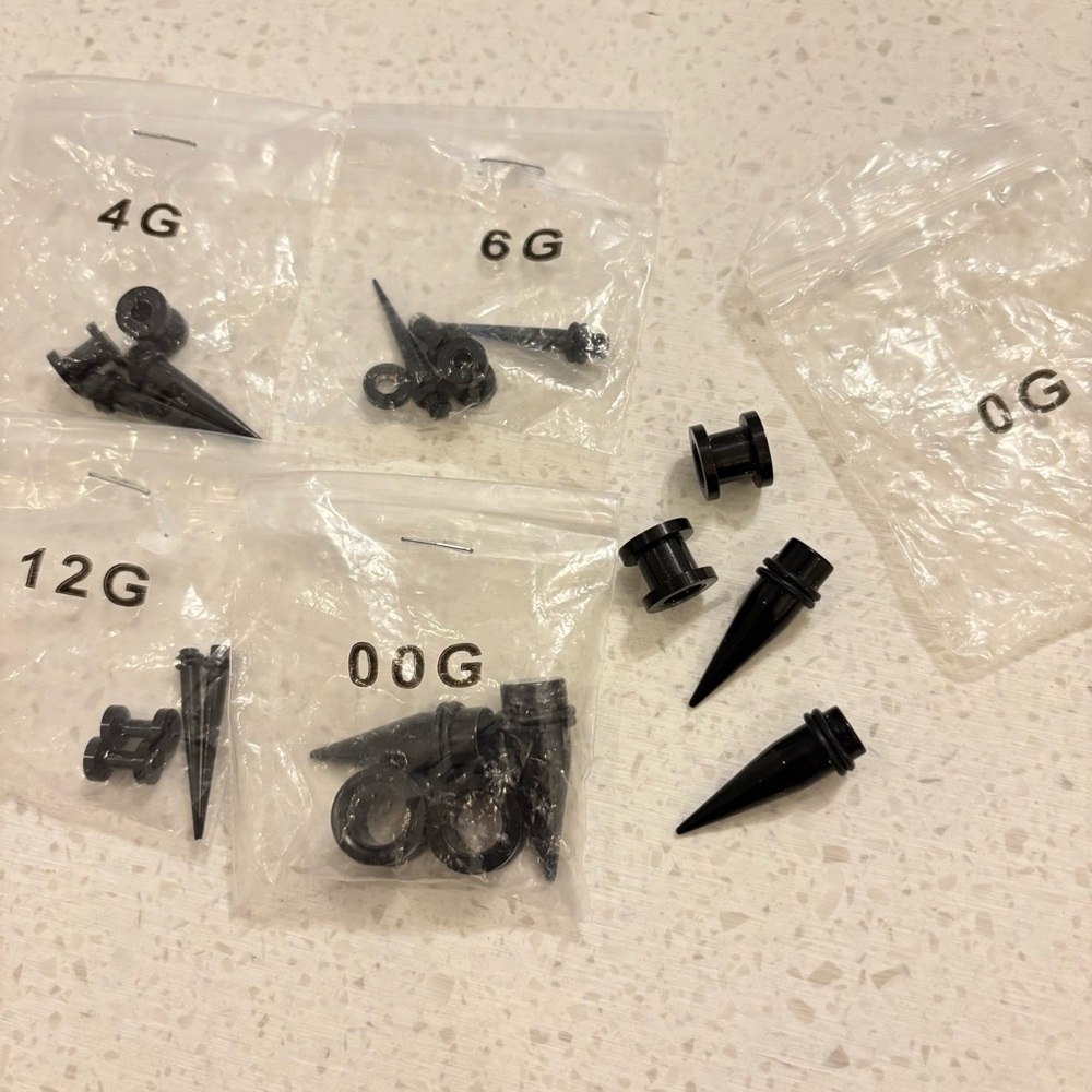 5/$25 Set of Black Metal Ear Gauges and Spike Tapers